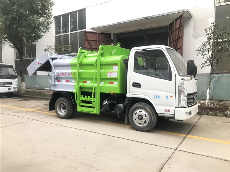 東風多利卡D7國六壓縮式垃圾車車身小巧靈活，上料速度快